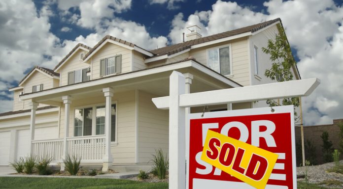 Image of a property with a sold sign
