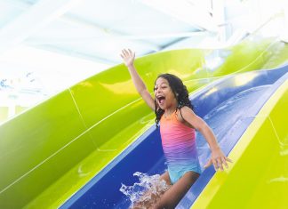 Image of a child at Haven Holidays on a waterslide